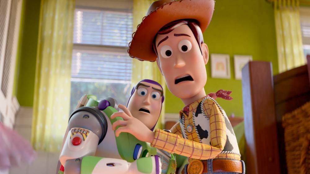 Toy Story characters Buzz and Woody with a horrified expression