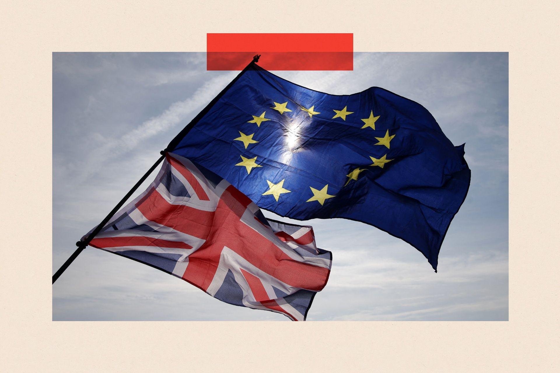 Two flags flying next to one another - the union jack and the EU flag