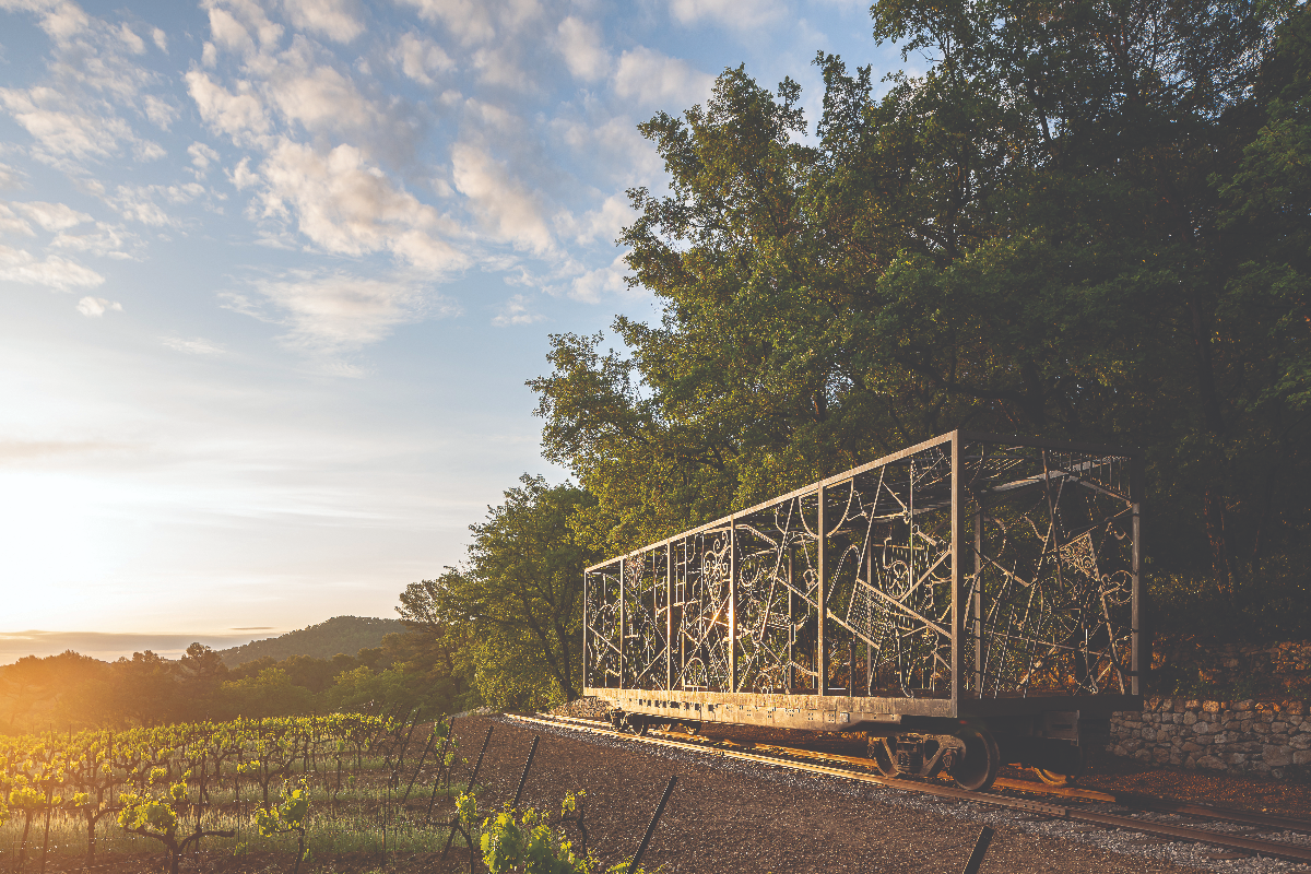 Billionaire former Claridges owners expansive French vineyard landscape under a clear sky
