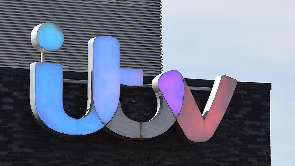 Multi-coloured ITV logo on the side of the company's building in Salford's MediaCity
